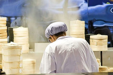 Restaurant kitchen with steamer baskets, reference for switchgear in quick service restaurants