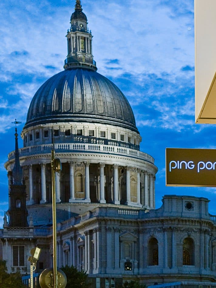 St Paul’s Cathedral in London next to a restaurant chain outlet